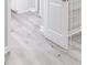 Laundry room with gray floors and open rack at 277 W Smith St, Lincolnville, SC 29485