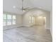 Inviting living room with modern flooring, vaulted ceiling, and an open floor plan, perfect for entertaining at 277 W Smith St, Lincolnville, SC 29485