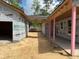 Covered walkway connects the garage and home at 277 W Smith St, Lincolnville, SC 29485