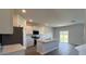 Open-concept kitchen with a center island, stainless steel appliances, and modern cabinets at 283 Blue Haw Dr, Moncks Corner, SC 29461