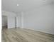 This bedroom features wood-look flooring and a neutral color palette at 293 Blue Haw Dr, Moncks Corner, SC 29461
