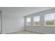 Bedroom featuring three windows for natural light at 293 Blue Haw Dr, Moncks Corner, SC 29461