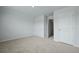 An empty bedroom with neutral carpet and trim is freshly painted at 293 Blue Haw Dr, Moncks Corner, SC 29461