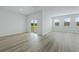 Bright living room with sliding glass doors to patio and ample natural light at 293 Blue Haw Dr, Moncks Corner, SC 29461