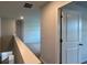 Hallway features neutral walls and plush carpeting at 295 Blue Haw Dr, Moncks Corner, SC 29461