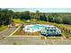 Pool area featuring a clubhouse, lounging area, and ample parking for community residents at 297 Blue Haw Dr, Moncks Corner, SC 29461