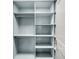 Walk-in closet with custom shelving and storage solutions at 3 Queen St # 315, Charleston, SC 29401