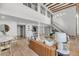 Inviting living and dining area boasting an open floor plan, lots of light, and hardwood floors at 3 Queen St # 315, Charleston, SC 29401