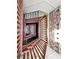 Beautiful staircase with brick accent wall at 3 Queen St # 315, Charleston, SC 29401