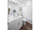 Bright bathroom with sleek fixtures, ample counter space, and white tiled walls at 307 Lanyard St, Johns Island, SC 29455