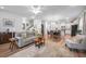 Open-concept living and dining area with modern decor, hardwood floors, and ample natural light at 307 Lanyard St, Johns Island, SC 29455