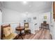 Cozy loft space with seating, unique decor, and light hardwood style flooring at 307 Lanyard St, Johns Island, SC 29455