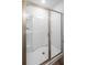 Modern glass-enclosed shower with sleek hardware and pristine white tile at 307 Lanyard St, Johns Island, SC 29455