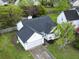 Aerial view of a house with a new roof, spacious yard, and convenient driveway at 308 Burton Ave, Summerville, SC 29485