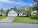 Charming single-story home with manicured lawn and mature trees in a quiet neighborhood at 308 Burton Ave, Summerville, SC 29485
