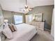 Spacious main bedroom features soft carpet and neutral wall color at 308 Burton Ave, Summerville, SC 29485