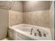 Image features a large white jetted tub in a bathroom at 3143 Bonanza Rd, Charleston, SC 29414