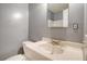 Small bathroom with a toilet and vanity sink, showcasing the basic amenities at 3143 Bonanza Rd, Charleston, SC 29414