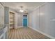 Open room offers versatile space, featuring wood-paneled walls and a ceiling fan at 3143 Bonanza Rd, Charleston, SC 29414