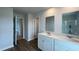 Modern bathroom features double vanity with white cabinets and framed mirrors at 315 Blue Haw Dr, Moncks Corner, SC 29461