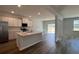 Modern kitchen featuring white cabinets, stainless steel appliances, and a central island at 315 Blue Haw Dr, Moncks Corner, SC 29461