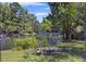 Backyard featuring a firepit and a view of the lake at 3168 Stanyarne Dr, Charleston, SC 29414