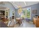 Breakfast nook features a cathedral ceiling, lots of light, and views of the yard at 3168 Stanyarne Dr, Charleston, SC 29414