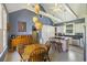 Charming kitchen/dining area with a pitched ceiling, island, and ample cabinet space at 3168 Stanyarne Dr, Charleston, SC 29414