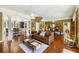 Open-concept living room with hardwood floors and classic decor at 3168 Stanyarne Dr, Charleston, SC 29414