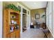 Bright sunroom with tile floors, plants, and large windows at 3168 Stanyarne Dr, Charleston, SC 29414