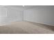 Inviting carpeted bedroom with a bright window offering scenic views at 323 Blue Haw Dr, Moncks Corner, SC 29461