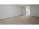 Expansive bedroom with soft carpeting and ample natural light showcasing comfort at 323 Blue Haw Dr, Moncks Corner, SC 29461