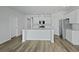Large kitchen with white cabinets, stainless steel appliances, and center island at 323 Blue Haw Dr, Moncks Corner, SC 29461