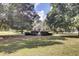 Picturesque gazebo nestled among mature trees and manicured lawns on a beautiful day at 3302 Porchview Pl, Johns Island, SC 29455