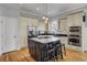 Modern kitchen with center island, stainless steel appliances, and custom cabinets at 3302 Porchview Pl, Johns Island, SC 29455