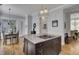 View of the kitchen island with built in cooktop and view of the breakfast nook at 3302 Porchview Pl, Johns Island, SC 29455