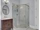 Elegant main bathroom with marble shower, glass door, and vanity at 3302 Porchview Pl, Johns Island, SC 29455