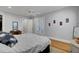 Main bedroom with white french doors and hardwood flooring at 3302 Porchview Pl, Johns Island, SC 29455