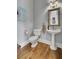 Powder room with pedestal sink, framed mirror, and light fixture at 3302 Porchview Pl, Johns Island, SC 29455