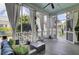 Relaxing screened porch with comfortable seating and outdoor views at 3302 Porchview Pl, Johns Island, SC 29455
