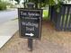 A sign pointing to the walking trail in The Arbors in St. Johns Woods community at 3302 Porchview Pl, Johns Island, SC 29455