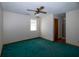This bedroom features green carpet, ceiling fan and walk-in shower at 389 Maggie Rd, Mount Pleasant, SC 29464