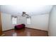 A simple bedroom featuring hardwood floors, a ceiling fan and mini-blinds at 389 Maggie Rd, Mount Pleasant, SC 29464