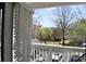 Balcony view overlooking street with parking and bare trees at 45 Sycamore Ave # 1327, Charleston, SC 29407