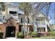 Stylish condo building with brick accents, manicured landscaping, and ample parking at 45 Sycamore Ave # 1327, Charleston, SC 29407