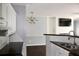 View from the kitchen of the living room featuring recessed lighting and dark wood flooring at 45 Sycamore Ave # 1327, Charleston, SC 29407