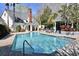 Outdoor community pool area includes a gazebo, lounge chairs, and well maintained landscaping at 45 Sycamore Ave # 1327, Charleston, SC 29407