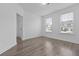 Bright bedroom with two windows offers a warm and inviting space at 470 Gianna Ln, Goose Creek, SC 29445