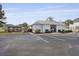 Community pool with parking and picnic area near residential homes at 470 Gianna Ln, Goose Creek, SC 29445