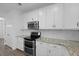 Kitchen area features stainless steel microwave, oven and granite countertops at 470 Gianna Ln, Goose Creek, SC 29445